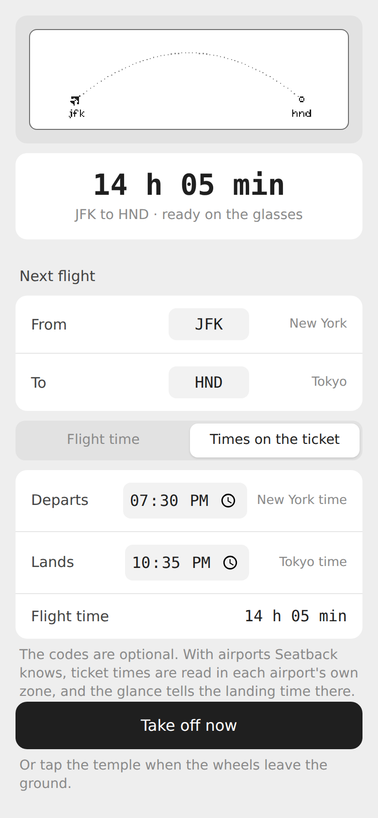 Seatback's phone page before a flight: JFK to HND, the departure and landing times from the ticket, each in its own city's time, and the flight time worked out.